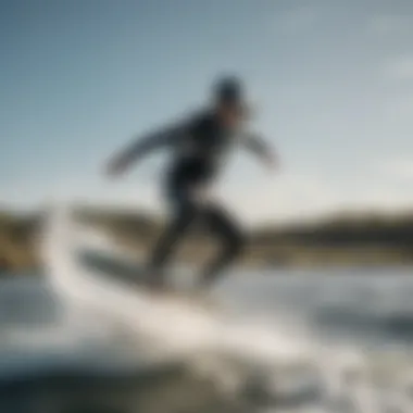 An athlete showcasing the performance capabilities of an Airush kiteboard on water.