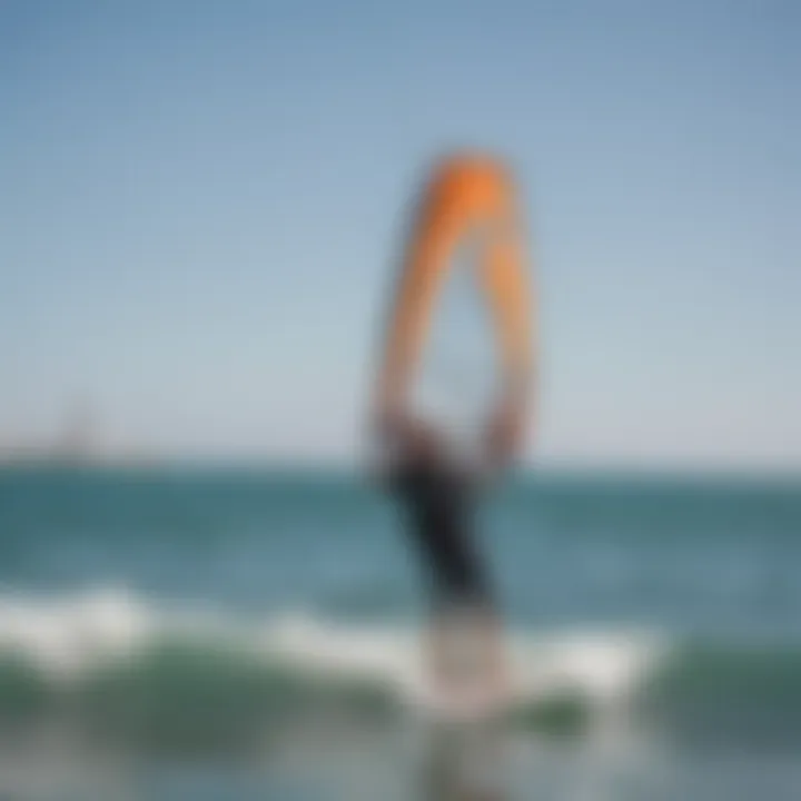 An instructor demonstrating kitesurfing techniques to a student