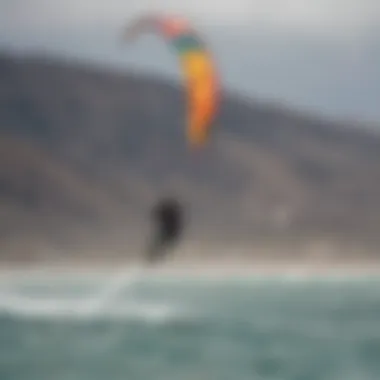 Vibrant kiteboarding scene in Baja California with colorful kites against the ocean backdrop