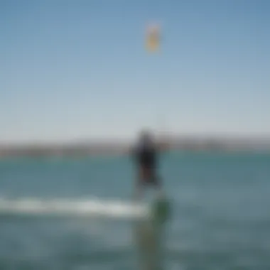 Kiteboarders gliding across the water during a community event