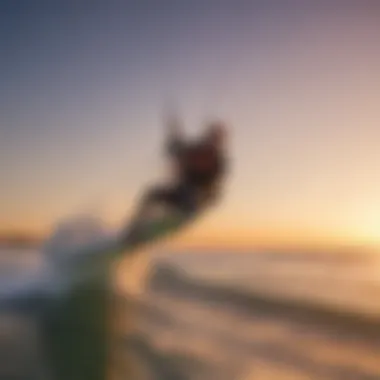 A kitesurfer gracefully carving through vibrant ocean waves at sunset