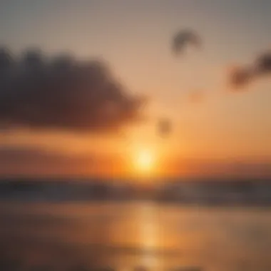 A vibrant sunset view with kitesurfers silhouetted against the sky.