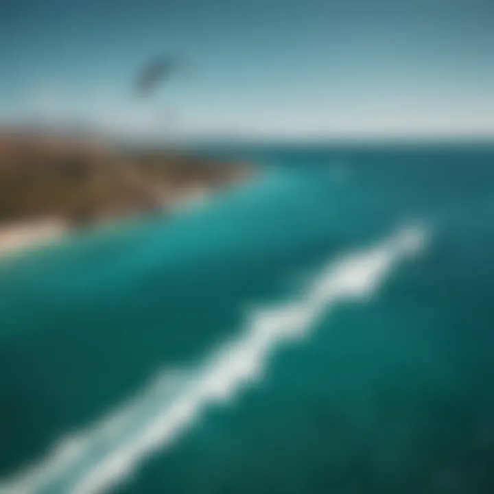 A breathtaking view of a kitesurfer gliding over the turquoise waters of Sicily.