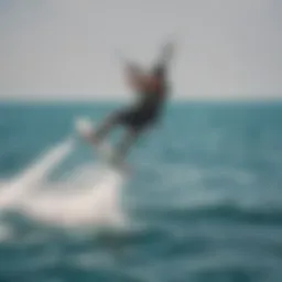 A dynamic view of kiteboarders using slingshot straps in action.