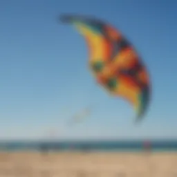 A vibrant large kite soaring against a clear blue sky