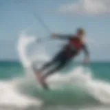 Dynamic kiteboarding action showcasing a rider soaring through the waves