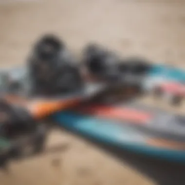 Close-up of kiteboarding gear laid out on the beach