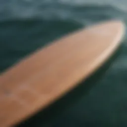 A close-up view of a sleek foilboard showcasing its innovative design