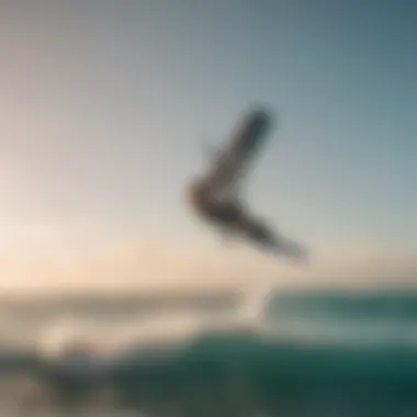 Kiteboarder performing tricks against a backdrop of stunning ocean waves