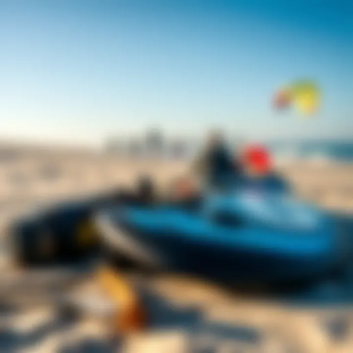 Close-up of kiteboarding equipment laid out on the beach