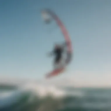 A surfer testing a kite surfboard in action