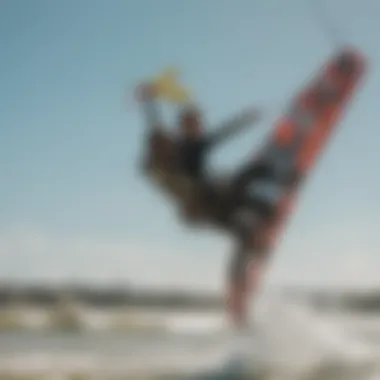 A kite surfer performing an impressive jump