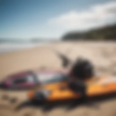 Kite surfing gear laid out on the beach