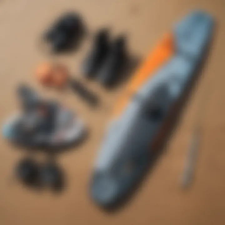 Close-up of kiteboarding gear laid out on the sandy beach