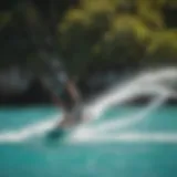 Kiteboarder gliding over turquoise waters