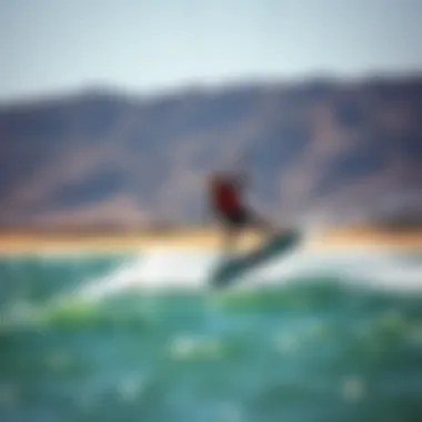 Kiteboarder in action, showcasing dynamic movements and skill on the water