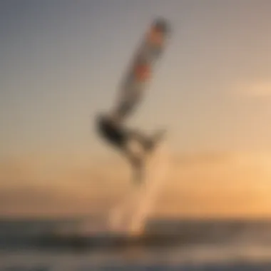 Kiteboarder launching into the wind against a sunset backdrop