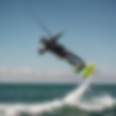 A kiteboarder expertly using a hydrofoil in a dynamic sea environment.