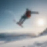 A kiteboarder gracefully soaring above a snow-covered landscape