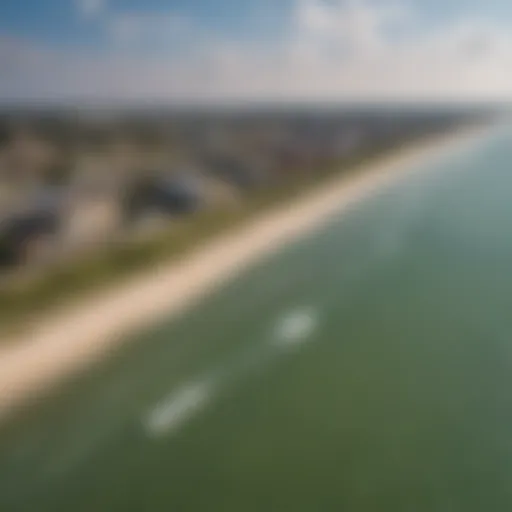 A panoramic view of Texas City Beach showcasing the pristine waters and sandy shores, perfect for kiteboarding.