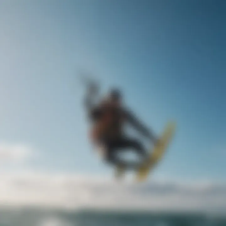 A close-up of a kitesurfer performing a complex trick mid-air