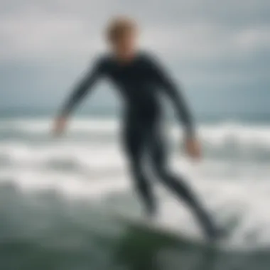 Surfer wearing wetsuit socks in the ocean