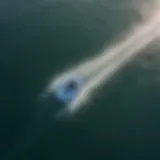 An aerial view of a hydro foil kite in action over water, showcasing its unique design.