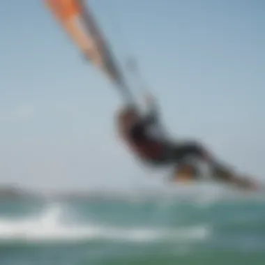 Kiteboarder demonstrating effective use of safety straps