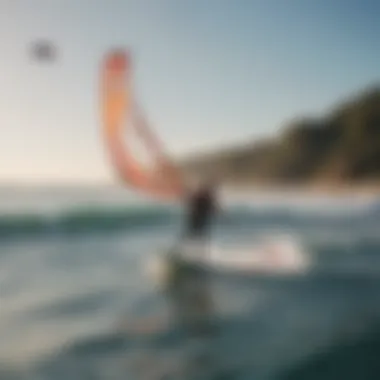 A kiteboarder skillfully navigating waves while paddleboarding with a kite