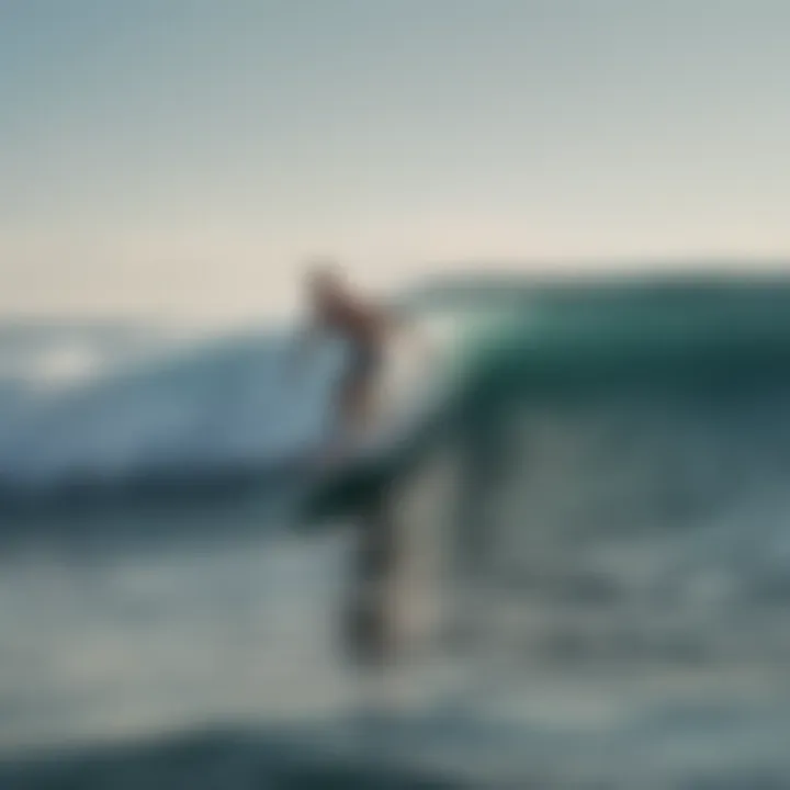 Surfer riding a Wavemaster surfboard in waves